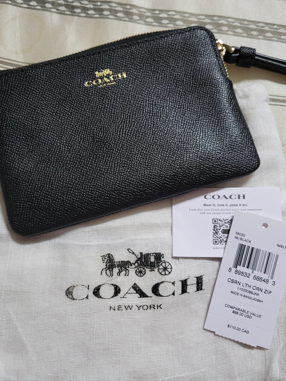 COACH Black Leather Wristlet with Gold Logo
